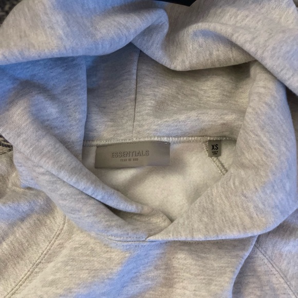 Fear of God ESSENTIALS
Off-White 1977 Hoodie
Size XS
Color Light Oatmeal - Picture 3 of 6